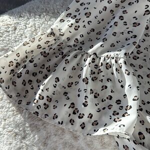 Leopard print blouse with flouncy arms. 100% polyester